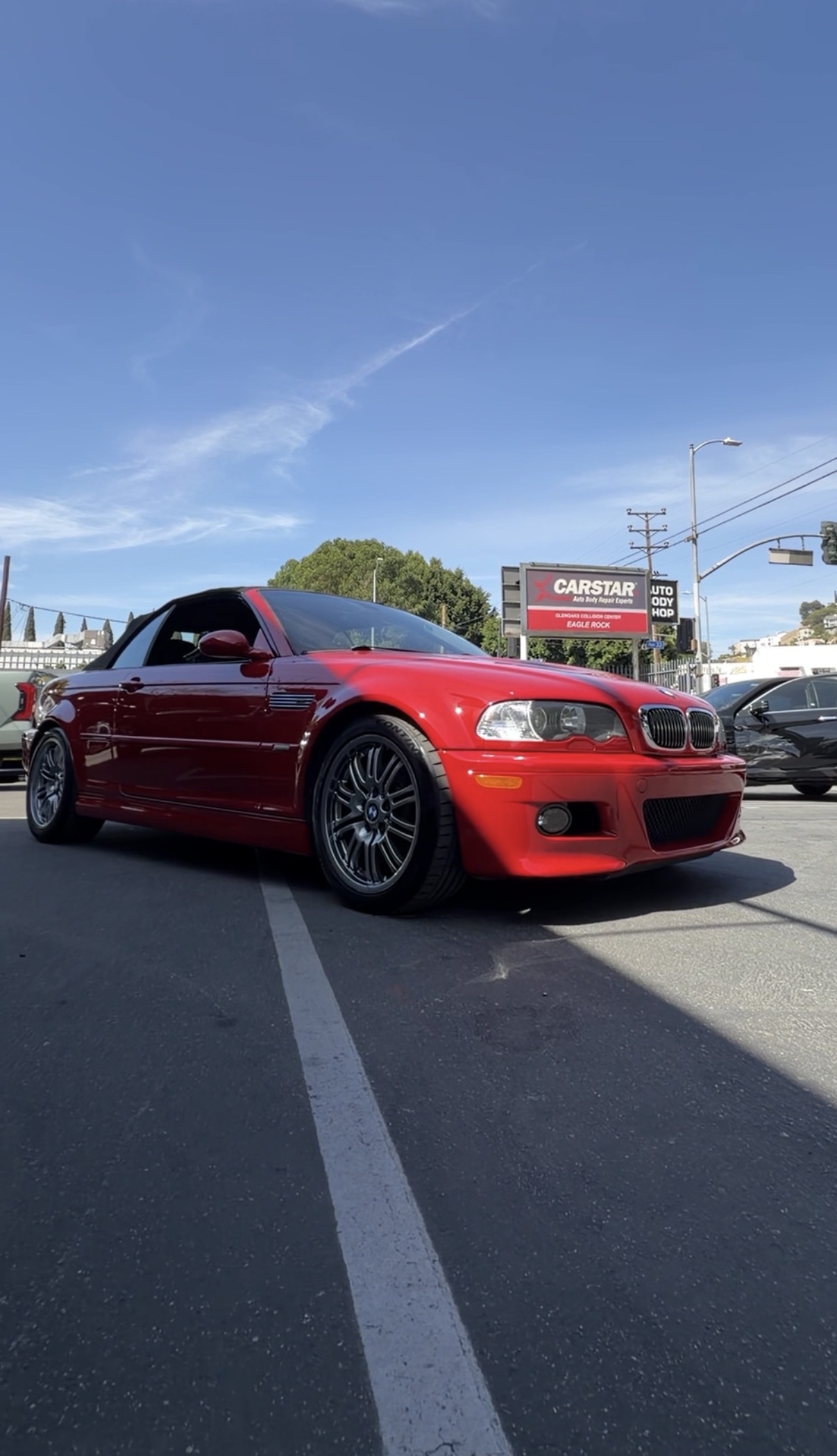 Red BMW outside the CARSTAR Eagle Rock collision repair facility